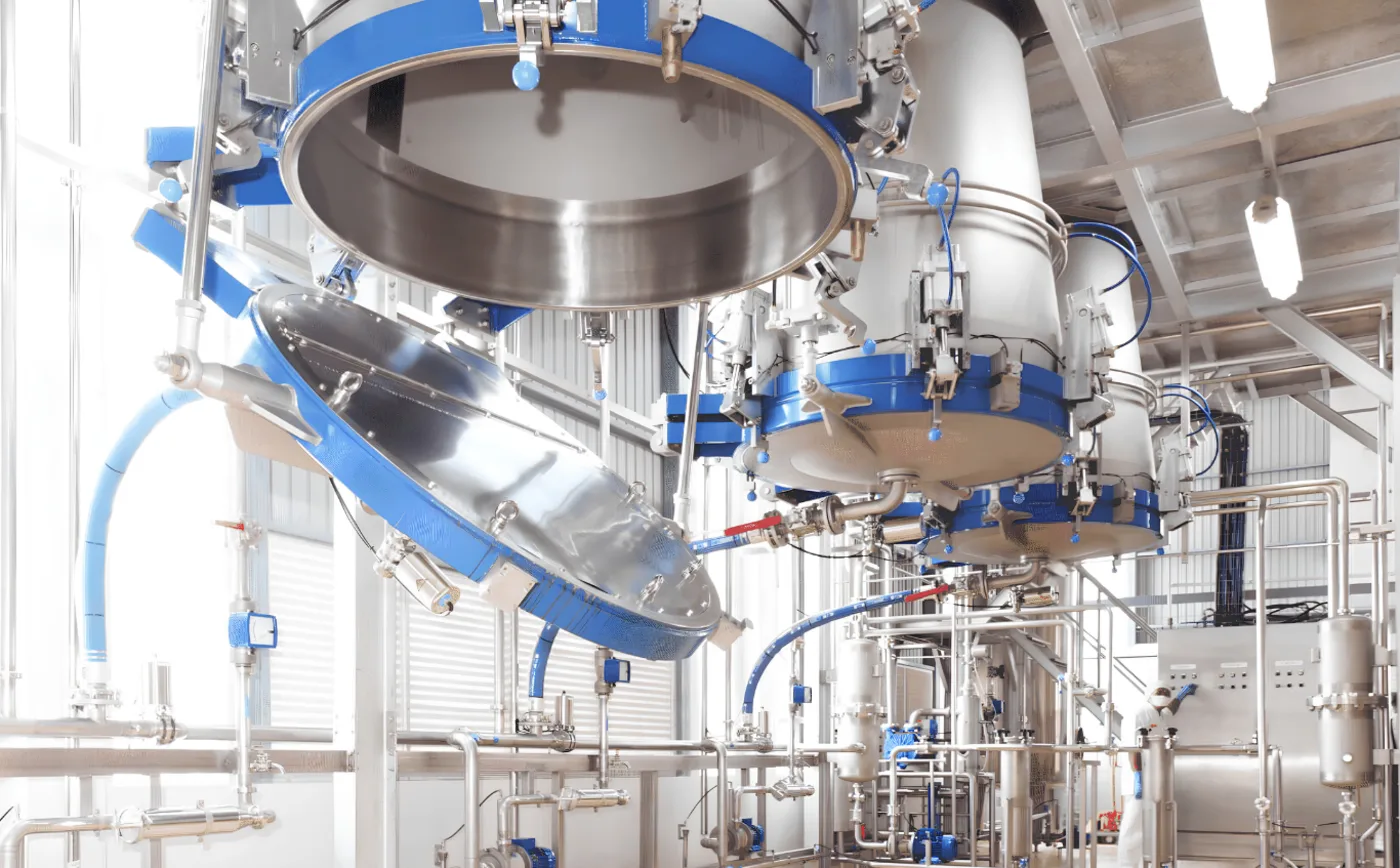 Stainless steel extraction vessels inside the SHI production facility